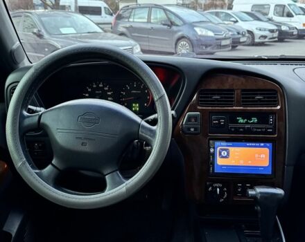 Чорний Ніссан Патфайндер, об'ємом двигуна 3.3 л та пробігом 465 тис. км за 5600 $, фото 13 на Automoto.ua