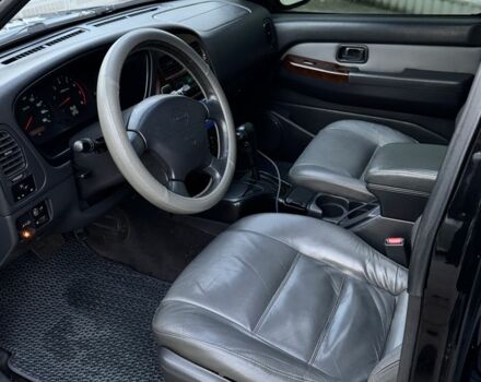 Чорний Ніссан Патфайндер, об'ємом двигуна 3.3 л та пробігом 465 тис. км за 5600 $, фото 9 на Automoto.ua