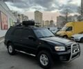 Чорний Ніссан Патфайндер, об'ємом двигуна 3.3 л та пробігом 465 тис. км за 5600 $, фото 4 на Automoto.ua