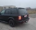 Черный Ниссан Патфайндер, объемом двигателя 3.5 л и пробегом 286 тыс. км за 4637 $, фото 2 на Automoto.ua