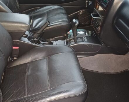 Черный Ниссан Патфайндер, объемом двигателя 3.5 л и пробегом 286 тыс. км за 4637 $, фото 4 на Automoto.ua