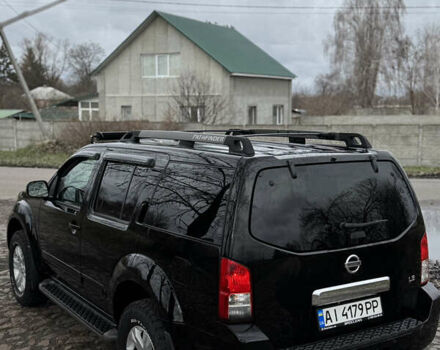 Черный Ниссан Патфайндер, объемом двигателя 4 л и пробегом 183 тыс. км за 9400 $, фото 4 на Automoto.ua