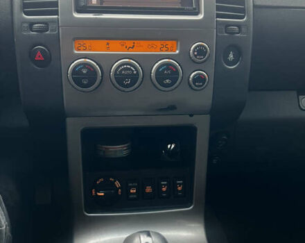 Черный Ниссан Патфайндер, объемом двигателя 2.49 л и пробегом 261 тыс. км за 11300 $, фото 23 на Automoto.ua