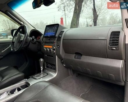 Черный Ниссан Патфайндер, объемом двигателя 2.49 л и пробегом 178 тыс. км за 13500 $, фото 25 на Automoto.ua