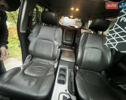 Черный Ниссан Патфайндер, объемом двигателя 2.49 л и пробегом 261 тыс. км за 11300 $, фото 10 на Automoto.ua