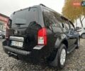 Ніссан Патфайндер 2007 у Смеле на Automoto.ua Чорний Ніссан Патфайндер, об'ємом двигуна 4 л та пробігом 300 тис. км за 9500 $, фото 1 на Automoto.ua