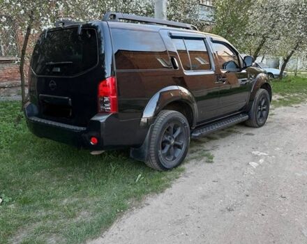 Черный Ниссан Патфайндер, объемом двигателя 4 л и пробегом 210 тыс. км за 10399 $, фото 3 на Automoto.ua