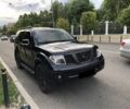 Черный Ниссан Патфайндер, объемом двигателя 4 л и пробегом 210 тыс. км за 10399 $, фото 2 на Automoto.ua