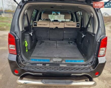 Черный Ниссан Патфайндер, объемом двигателя 2.5 л и пробегом 188 тыс. км за 10400 $, фото 12 на Automoto.ua