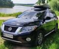 Черный Ниссан Патфайндер, объемом двигателя 3.5 л и пробегом 220 тыс. км за 13499 $, фото 1 на Automoto.ua