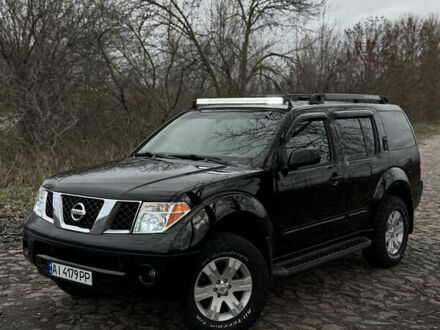 Черный Ниссан Патфайндер, объемом двигателя 4 л и пробегом 183 тыс. км за 9400 $, фото 1 на Automoto.ua