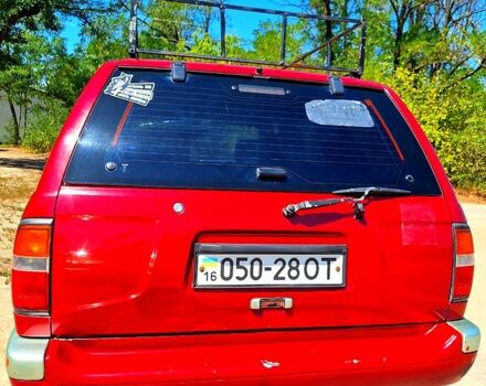 Красный Ниссан Патфайндер, объемом двигателя 3.3 л и пробегом 147 тыс. км за 3960 $, фото 1 на Automoto.ua