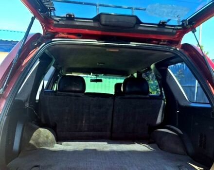 Красный Ниссан Патфайндер, объемом двигателя 3.3 л и пробегом 147 тыс. км за 3960 $, фото 6 на Automoto.ua