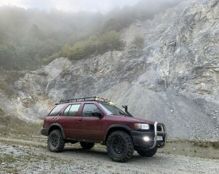 Красный Ниссан Патфайндер, объемом двигателя 3.3 л и пробегом 300 тыс. км за 4300 $, фото 7 на Automoto.ua