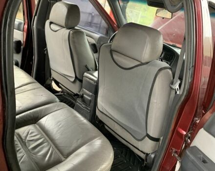 Красный Ниссан Патфайндер, объемом двигателя 3.3 л и пробегом 300 тыс. км за 4300 $, фото 14 на Automoto.ua