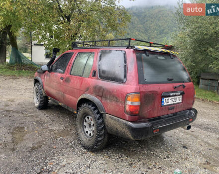 Червоний Ніссан Патфайндер, об'ємом двигуна 2.5 л та пробігом 300 тис. км за 4300 $, фото 7 на Automoto.ua