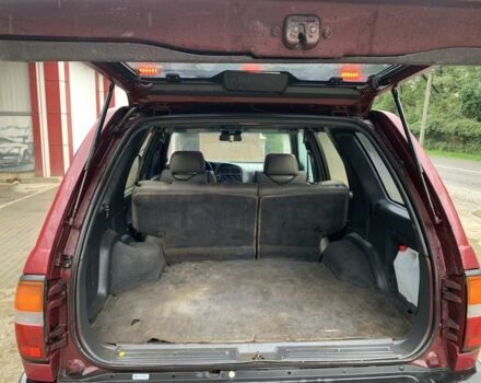 Красный Ниссан Патфайндер, объемом двигателя 3.3 л и пробегом 300 тыс. км за 4300 $, фото 11 на Automoto.ua