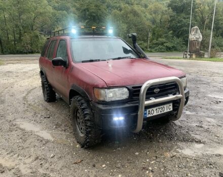 Красный Ниссан Патфайндер, объемом двигателя 3.3 л и пробегом 300 тыс. км за 4300 $, фото 1 на Automoto.ua