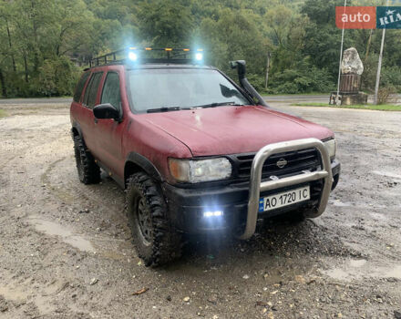Червоний Ніссан Патфайндер, об'ємом двигуна 2.5 л та пробігом 300 тис. км за 4300 $, фото 6 на Automoto.ua
