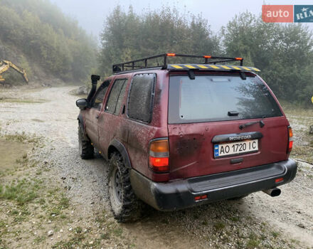 Червоний Ніссан Патфайндер, об'ємом двигуна 2.5 л та пробігом 300 тис. км за 4300 $, фото 1 на Automoto.ua