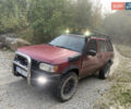 Червоний Ніссан Патфайндер, об'ємом двигуна 2.5 л та пробігом 300 тис. км за 4300 $, фото 3 на Automoto.ua