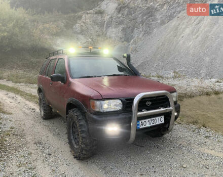 Червоний Ніссан Патфайндер, об'ємом двигуна 2.5 л та пробігом 300 тис. км за 4300 $, фото 1 на Automoto.ua