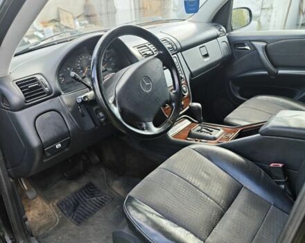 Серый Ниссан Патфайндер, объемом двигателя 3 л и пробегом 360 тыс. км за 3495 $, фото 7 на Automoto.ua