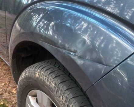 Серый Ниссан Патфайндер, объемом двигателя 2.49 л и пробегом 230 тыс. км за 6395 $, фото 4 на Automoto.ua