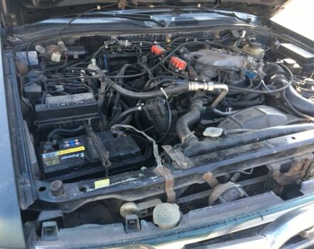 Зеленый Ниссан Патфайндер, объемом двигателя 3 л и пробегом 321 тыс. км за 4200 $, фото 7 на Automoto.ua