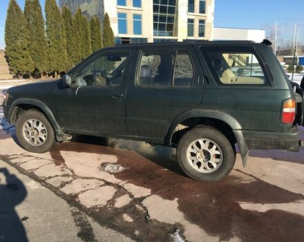 Зеленый Ниссан Патфайндер, объемом двигателя 3 л и пробегом 321 тыс. км за 4200 $, фото 1 на Automoto.ua