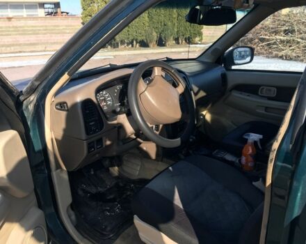 Зеленый Ниссан Патфайндер, объемом двигателя 3 л и пробегом 321 тыс. км за 4200 $, фото 3 на Automoto.ua