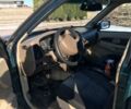 Зелений Ніссан Патфайндер, об'ємом двигуна 3 л та пробігом 321 тис. км за 4300 $, фото 3 на Automoto.ua