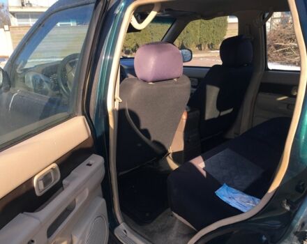 Зеленый Ниссан Патфайндер, объемом двигателя 3 л и пробегом 321 тыс. км за 4200 $, фото 2 на Automoto.ua