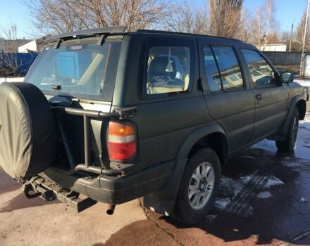 Зеленый Ниссан Патфайндер, объемом двигателя 3 л и пробегом 321 тыс. км за 4200 $, фото 4 на Automoto.ua