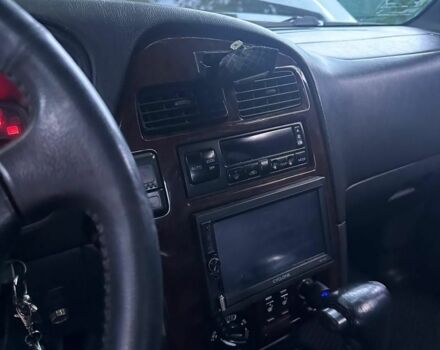 Зеленый Ниссан Патфайндер, объемом двигателя 3.3 л и пробегом 268 тыс. км за 3400 $, фото 2 на Automoto.ua