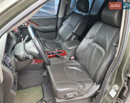 Зелений Ніссан Патфайндер, об'ємом двигуна 2.49 л та пробігом 286 тис. км за 8900 $, фото 9 на Automoto.ua