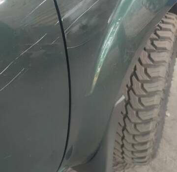 Зеленый Ниссан Патфайндер, объемом двигателя 2.49 л и пробегом 350 тыс. км за 6900 $, фото 4 на Automoto.ua