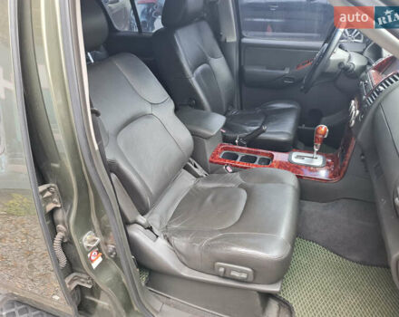 Зелений Ніссан Патфайндер, об'ємом двигуна 2.49 л та пробігом 286 тис. км за 8900 $, фото 10 на Automoto.ua