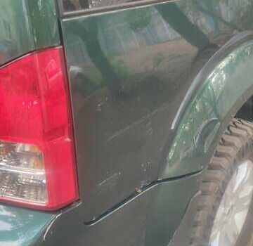 Зеленый Ниссан Патфайндер, объемом двигателя 2.49 л и пробегом 350 тыс. км за 6900 $, фото 3 на Automoto.ua