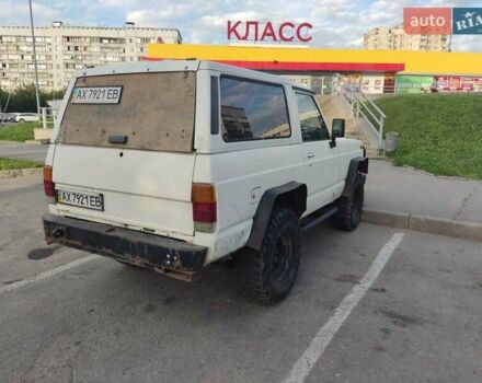 Білий Ніссан Патрол, об'ємом двигуна 3.2 л та пробігом 520 тис. км за 12000 $, фото 4 на Automoto.ua