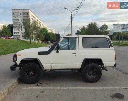 Білий Ніссан Патрол, об'ємом двигуна 3.2 л та пробігом 520 тис. км за 12000 $, фото 2 на Automoto.ua