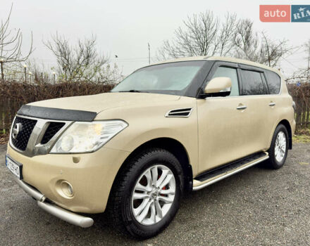 Бежевый Ниссан Патрол, объемом двигателя 5.6 л и пробегом 266 тыс. км за 16000 $, фото 13 на Automoto.ua