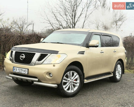 Бежевый Ниссан Патрол, объемом двигателя 5.6 л и пробегом 266 тыс. км за 16000 $, фото 2 на Automoto.ua