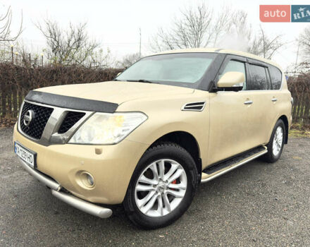 Бежевый Ниссан Патрол, объемом двигателя 5.6 л и пробегом 266 тыс. км за 16000 $, фото 1 на Automoto.ua