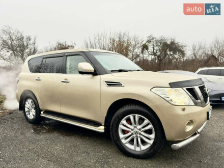 Бежевый Ниссан Патрол, объемом двигателя 5.6 л и пробегом 266 тыс. км за 16000 $, фото 1 на Automoto.ua