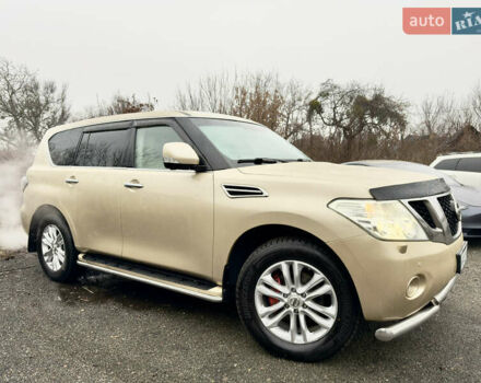 Бежевый Ниссан Патрол, объемом двигателя 5.6 л и пробегом 266 тыс. км за 16000 $, фото 1 на Automoto.ua