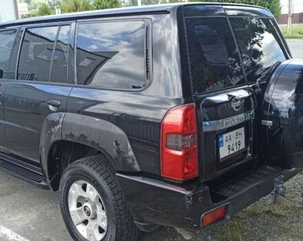 Чорний Ніссан Патрол, об'ємом двигуна 3 л та пробігом 270 тис. км за 25000 $, фото 3 на Automoto.ua