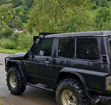 Чорний Ніссан Патрол, об'ємом двигуна 2.8 л та пробігом 320 тис. км за 10500 $, фото 4 на Automoto.ua