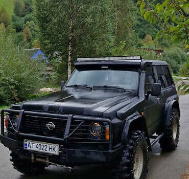 Чорний Ніссан Патрол, об'ємом двигуна 2.8 л та пробігом 320 тис. км за 10500 $, фото 1 на Automoto.ua