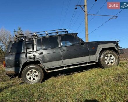 Черный Ниссан Патрол, объемом двигателя 2.8 л и пробегом 300 тыс. км за 5250 $, фото 2 на Automoto.ua